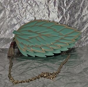 This is a Kate Spade New York Full Plume Mint Leaf Crossbody bag